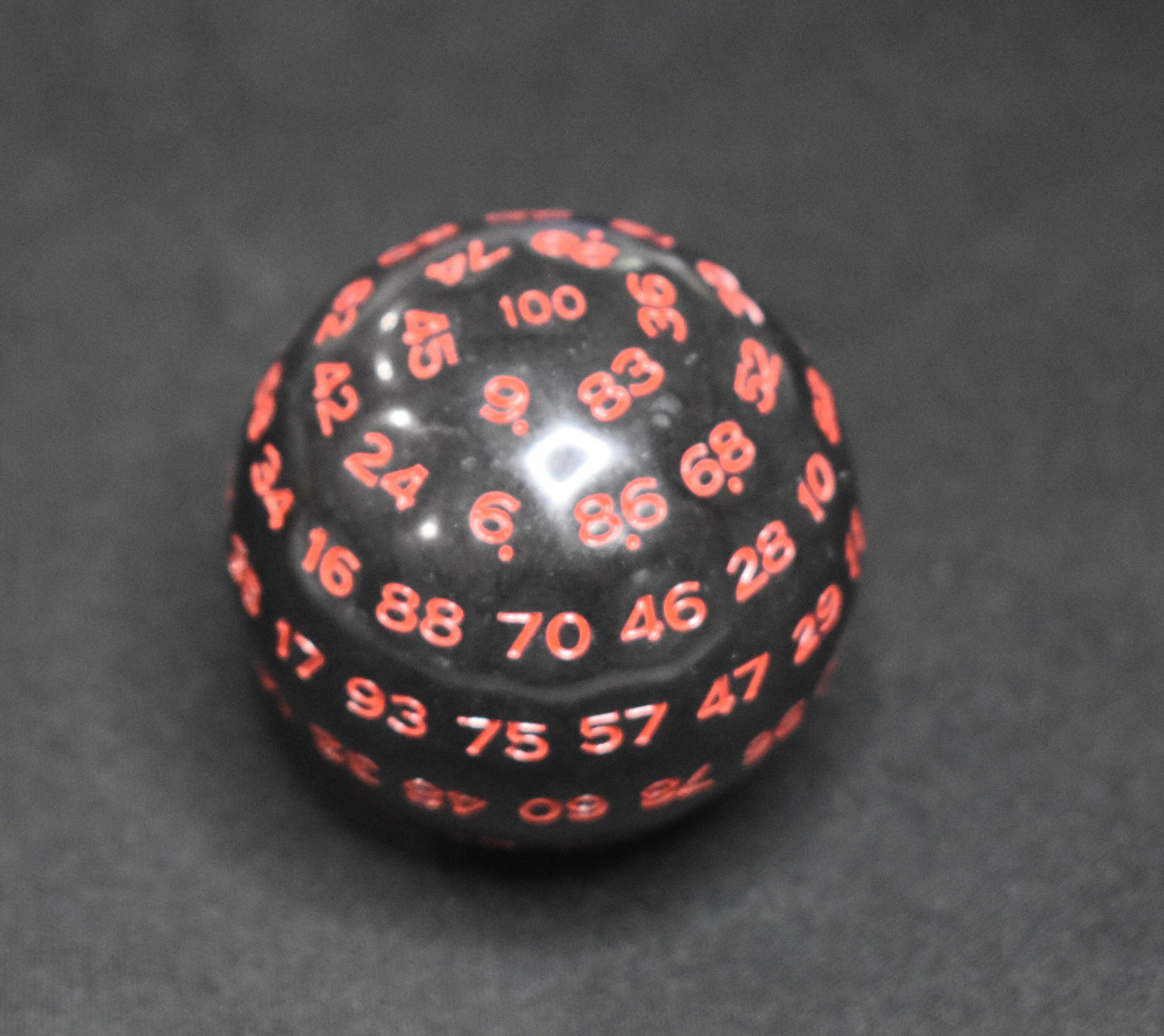 DragonSteel MD D100 Resin Dice (Black w/ Red Font)