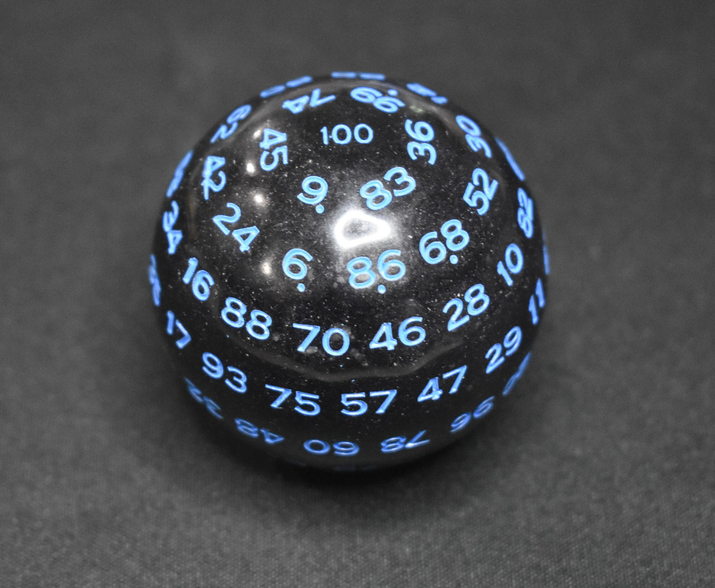 DragonSteel MD D100 Resin Dice (Black w/ Blue Font)